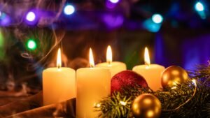 White candles on a wooden table