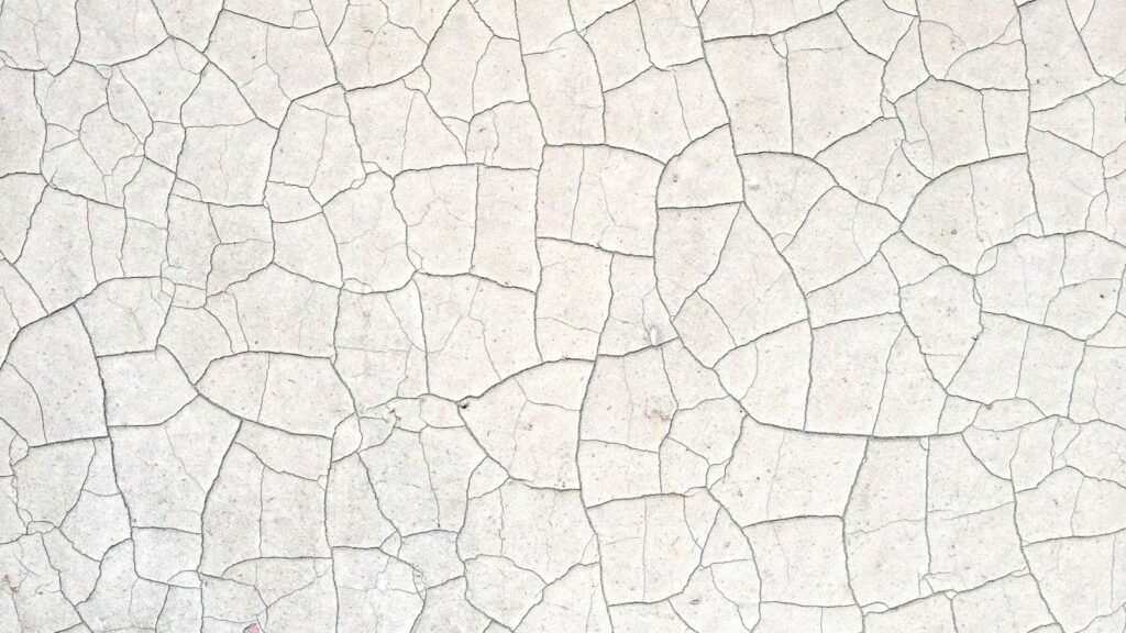 A white wall with cracks