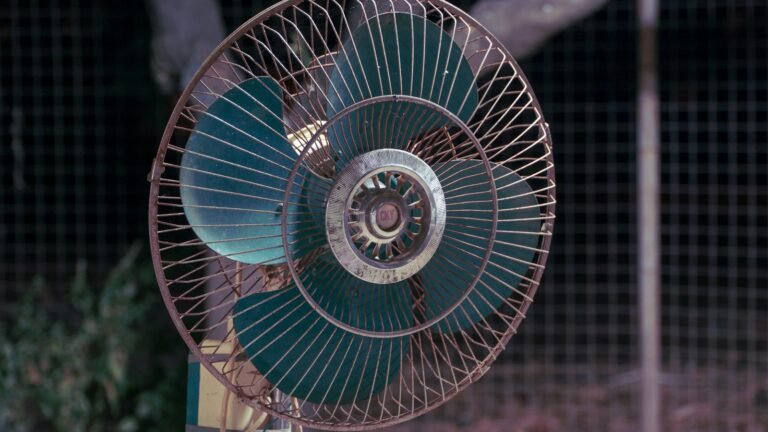 White and blue desk fan