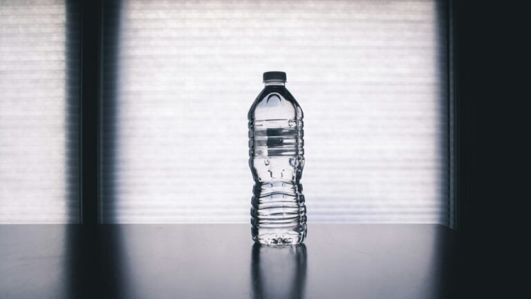 Clear drinking bottle filled with water