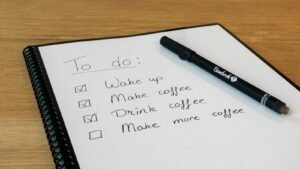 A notepad with a pen