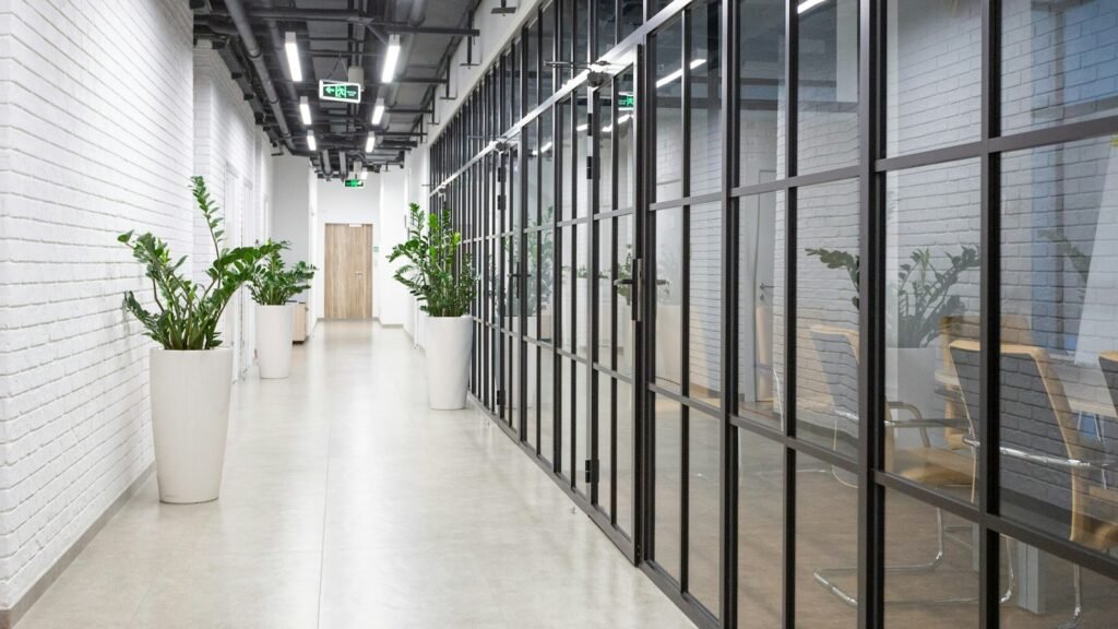 White office hallway with glass windows