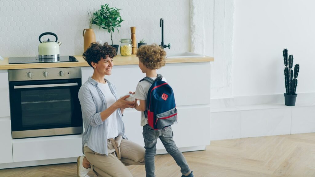 A woman and a child in a kitchen